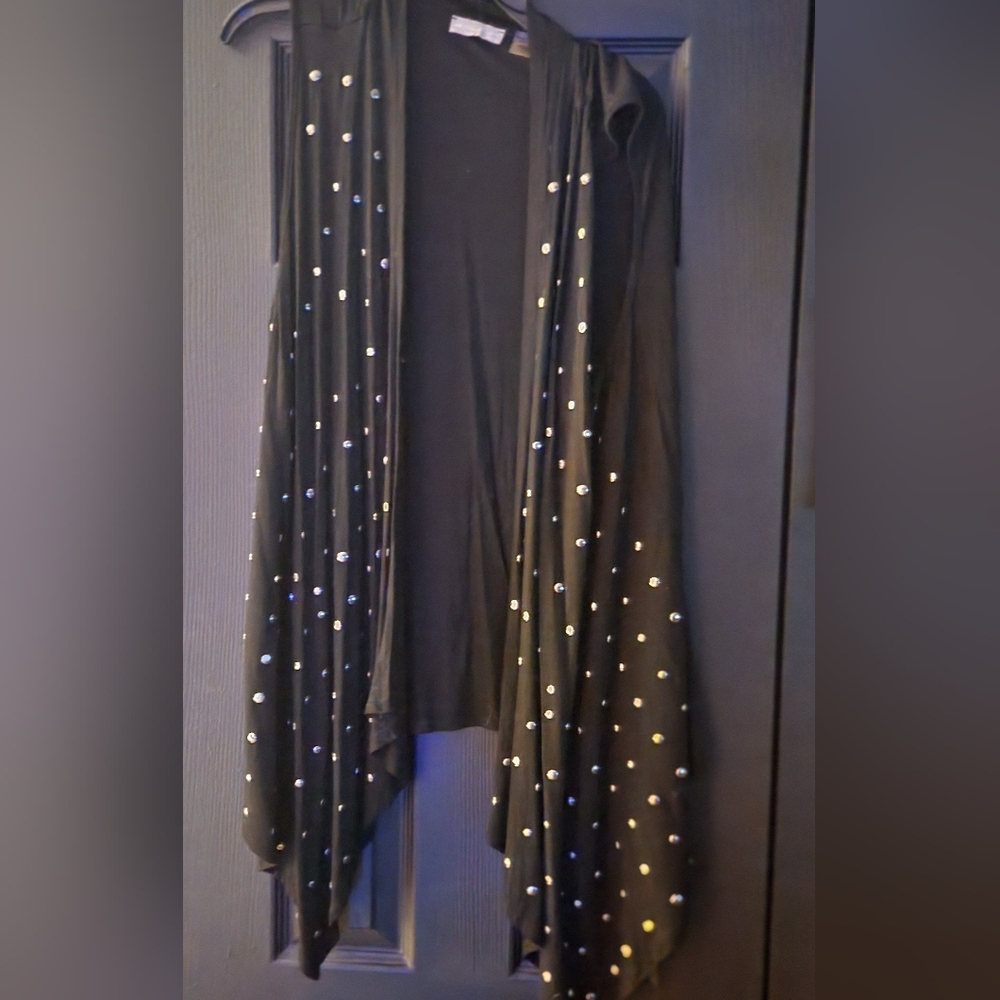 Evolution by cyrus sleeveless cardigan..